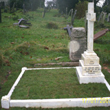 The same headstone after restoration