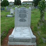 The same headstone after restoration