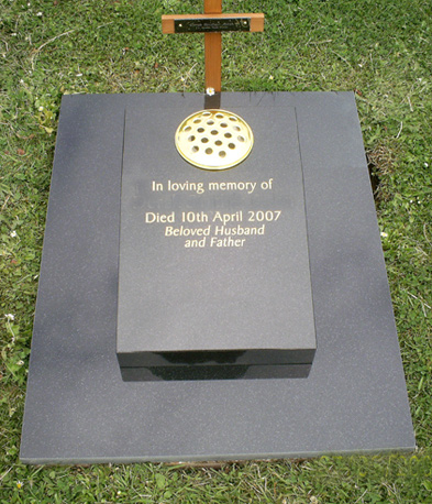 Black granite cremation tablet on a plinth