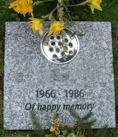 Grey granite tablet with a flower container