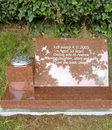 Red granite tablet with a vase