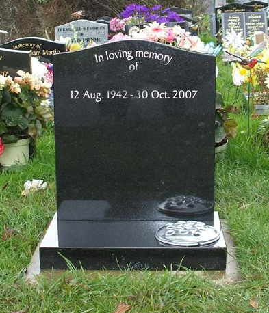 Black granite headstone with silver lettering