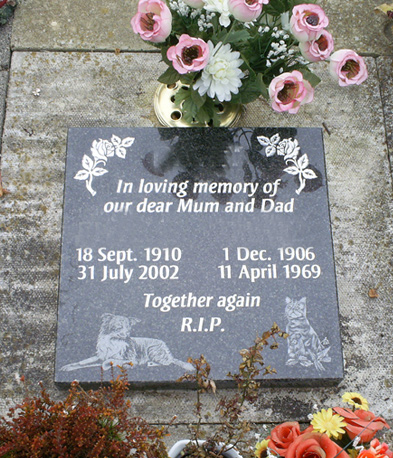 Grey granite tablet with carved roses
