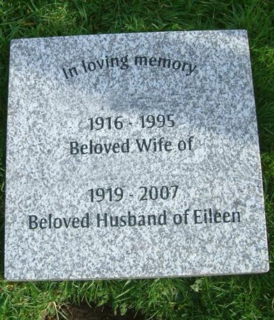 Light grey granite tablet with black lettering